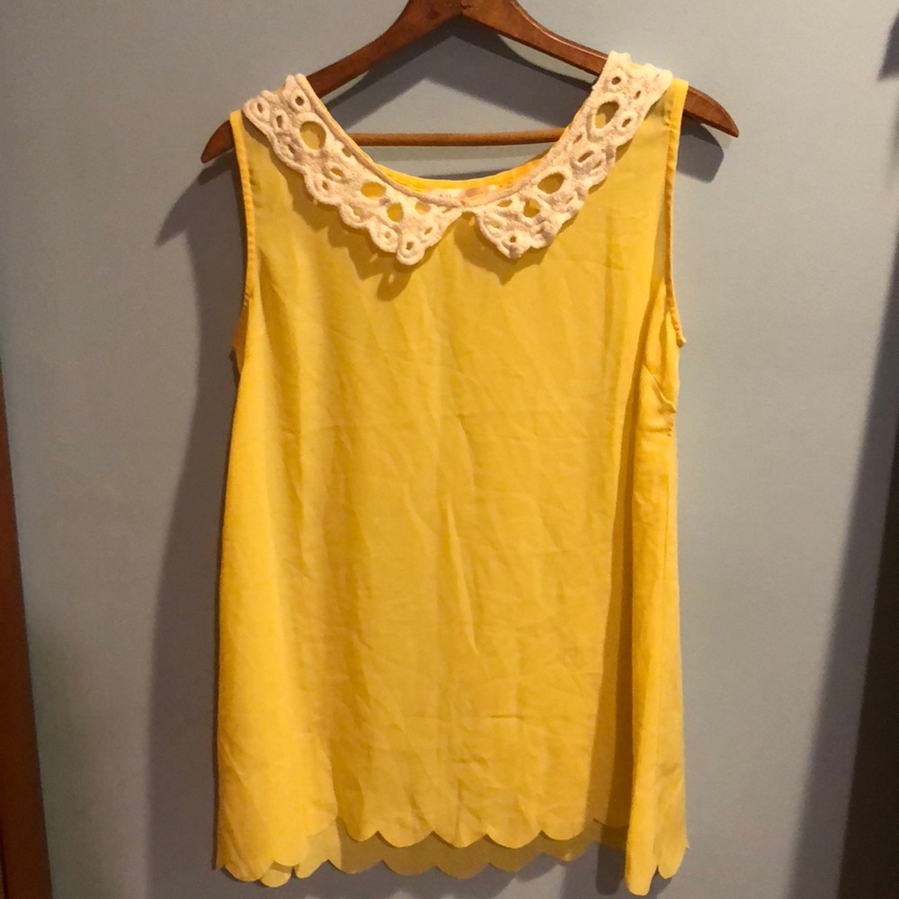 Yellow sleeveless blouse